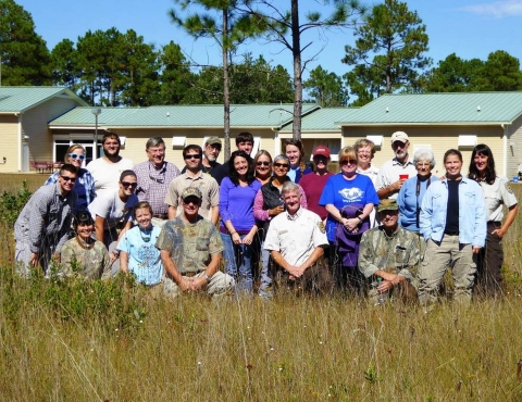 Group photo of volunteers and staff during an annual crane count