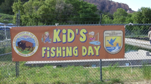 Kids fishing day sign at Jones Hole