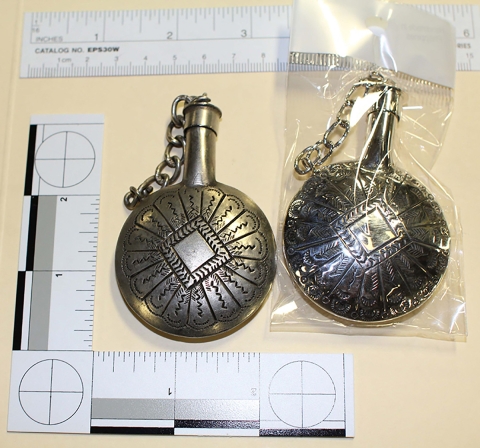Authentic Native American made canteen on the left compared to its counterfeit on the right with measuring rulers above and on the left of them both.