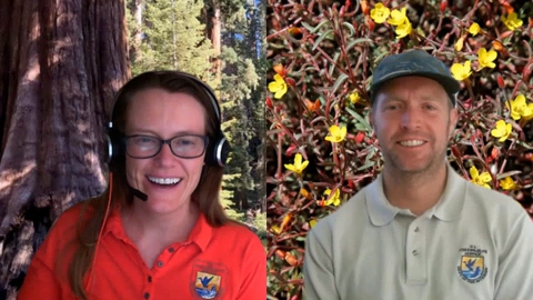 A woman in a red shirt and a man in a tan shirt with USFWS logos