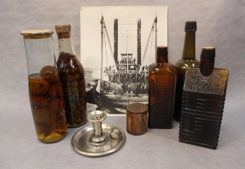 A display of amber bottles retrieved from a riverboat that sank in 1865.