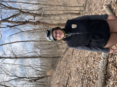 Image of FWS worker wearing a caving helmet