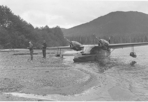 seaplane in shallows along an alaskan sandbar