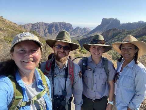 Biologists in front of mountains in Big Bend National Park