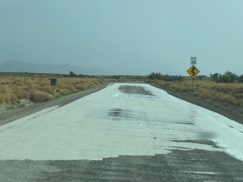 water covering a dirt road