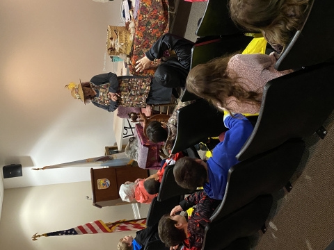 lady talking to students 