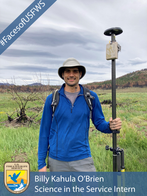 A man wearing a blue jacket and holding a scientific tool that looks like a long black pole. A banner in the top left corner says "#FacesofUSFWS". A banner across the bottom says "Billy Kahila O'Brien. Science in the Service intern". The USFWS logo appears in the bottom left corner
