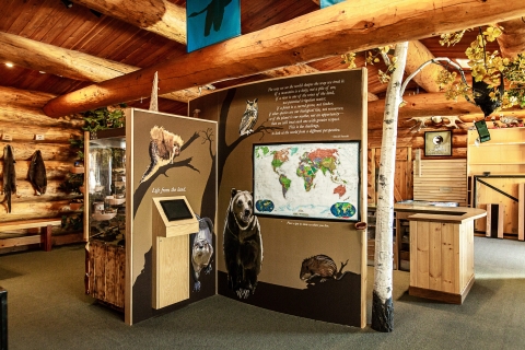 educational displays inside a log building