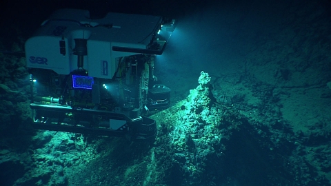 Underwater vehicle uses lights to illuminate the ocean depths.
