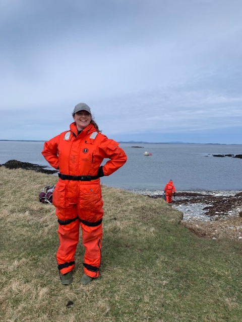 Meg Harrington wears a dry suit on the shores of one of Maine's Coastal Island