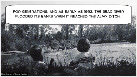 Black and white image of two children sitting on a river bank with a speech bubble that says "For generations, and as early as 1952, the Bear River flooded its banks when it reached the Almy Ditch"