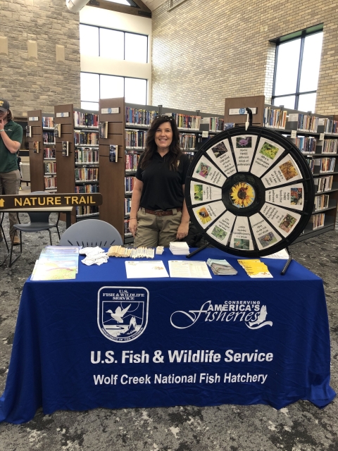 Wolf Creek National Fish Hatchery table at Read Across Russell County event 
