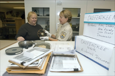 Service employees archive historical records