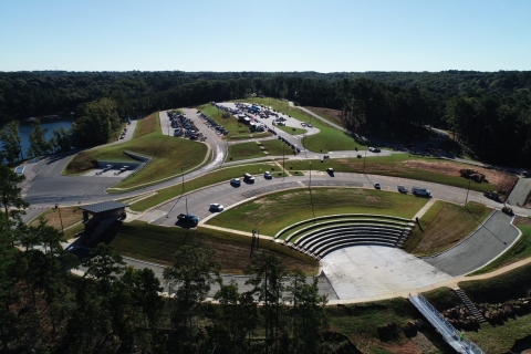 Aerial view of a large boating facility parking area and amphitheater