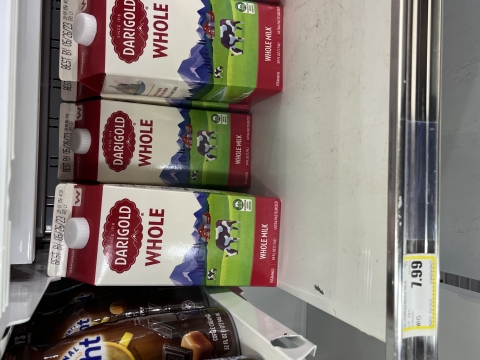cartons of milk at the grocery store in remote alaska