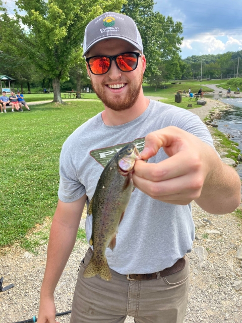 Man holding Rainbow trout 
