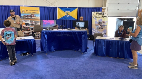 Fish and Wildlife Service booth at EAA AirVenture convention 