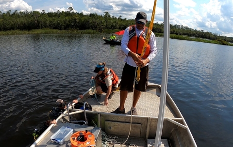 Deploying array from boat in Cooper's Basin, Florida.