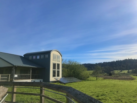 The Richard J. Guadagno Visitor Center under a blue-sky morning in Humboldt Bay National Wildlife Refuge