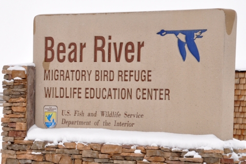 Sign for the Bear River Refuge. "Bear River Migratory Bird Refuge. Wildlife Education Center"