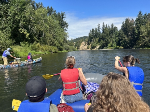 Students in a raft floating Oregon's Clackamas River