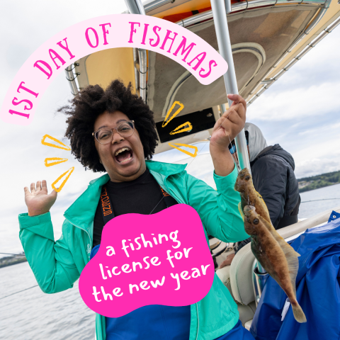 A person with a huge grin on their face stands in waders on a boat holding fish. Text on image reads "1st Day of Fishmas, a fishing license for the new year."