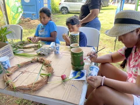 Participants make holiday eco-crafts at Guam National Wildlife Refuge