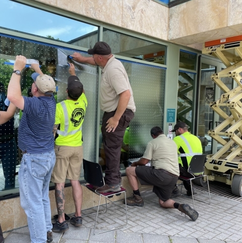 MAT team installing bird-friendly materials at Patuxent Wildlife Refuge