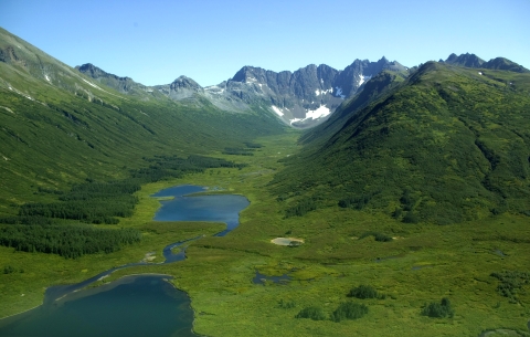 An aerial view of the mountains and green valleys of Togiak National Wildlife Refuge 