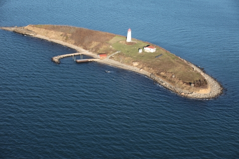 An aerial view of Falkner Island, lighthouse, and building, in CT