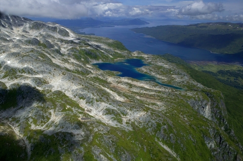 aerial of misty fords, deep glacial valleys, and lofty mountains distinguish the 1.9 million-acre refuge. 