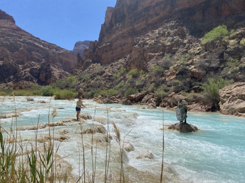 Michael Pillow and Tiffany Love-Chezem check a hoopnet on the April 2021 LCR monitoring trip_