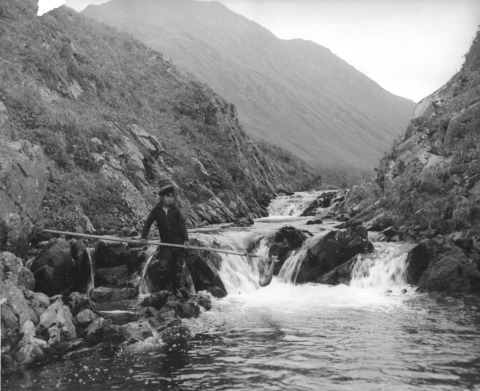Man fishing on river