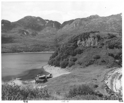 Mountains and a bay with a sea plane