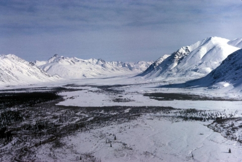 Snow covered mountains and river
