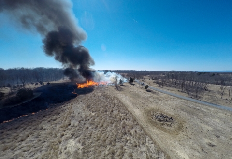 Aerial view taken by drone of a prescribed burn at the National Conservation Training Center