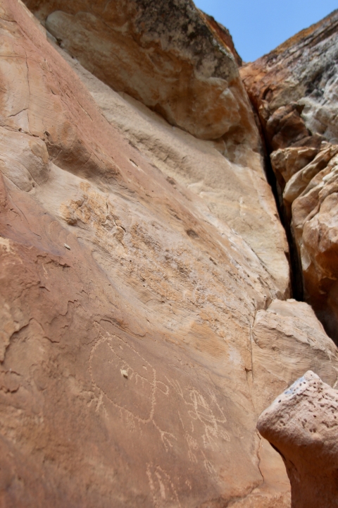 Rock face with carvings