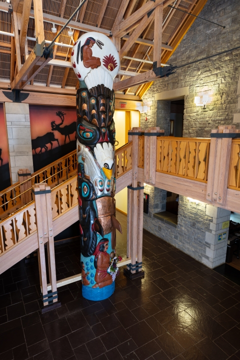 Sacred Sites Totem Pole at National Conservation Training Center. This totem pole was carved by members of the House of Tears Carvers of the Lummi Nation. The totem pole was donated from the Native Organizers Alliance.