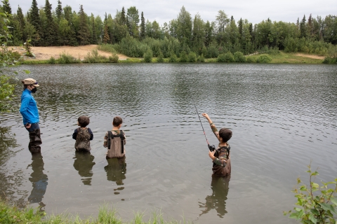Children fishing in Taku Lake, Anchorage.