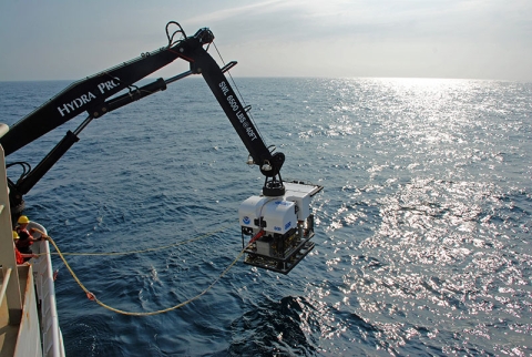 NOAA's deepwater remotely operated vehicle, Deep Discoverer (D2), is deployed off the fantail of the ship