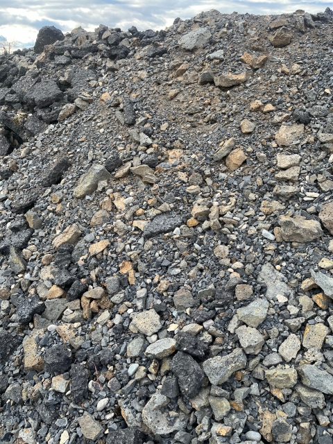 A pile of gravel and crushed asphalt