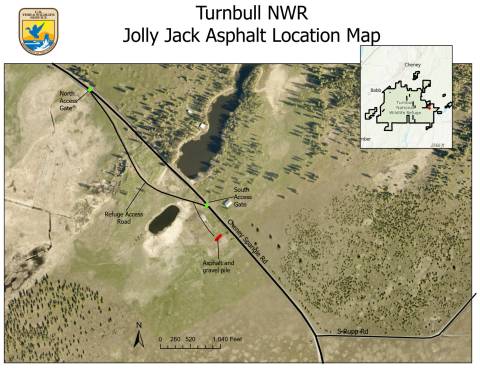 A map showing a portion of the Turnbull NWR where a gravel lot is up for bid. The map shows a main thoroughfare, a refuge access road indicated by two green dots, and a red dot indicating the available pile of asphalt and gravel. 