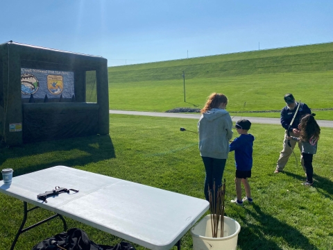 Kids shooting blow up archery