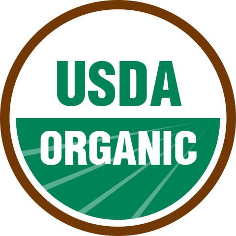 U.S. Department of Agriculture Organic logo with illustrated farm overlaid with "USDS Organic" text'