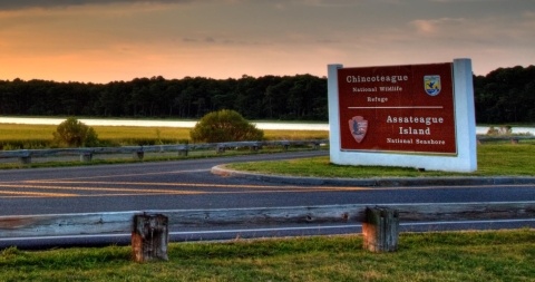The Chincoteague and Assateague welcome sign at the entrance to Chincoteague National Wildlife Refuge.