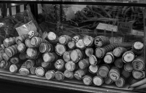Black and white image of stacked up saiga horns