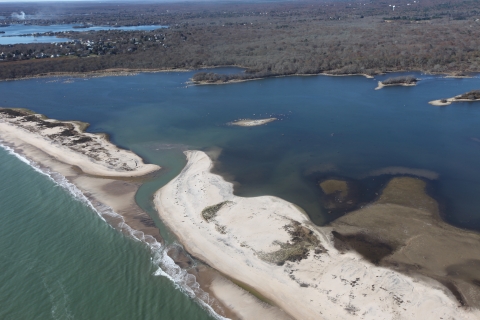An aerial image of a breach at Trustom Pond in Rhode Island following Hurricane Sandy. 