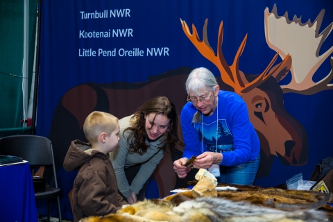 FWS staff and Friends deliver an education program to an event participant