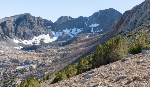 A view of rocky mountains on a steep slope