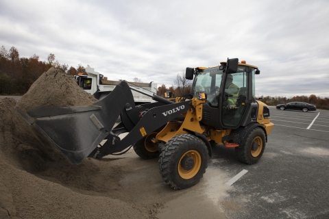 Wage grade worker with front end loader